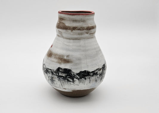 Mountain scene with red rim and red moon